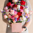 Luxury flower box with red white and pink roses