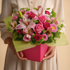 Elegant pink floral arrangement with gypsophilia